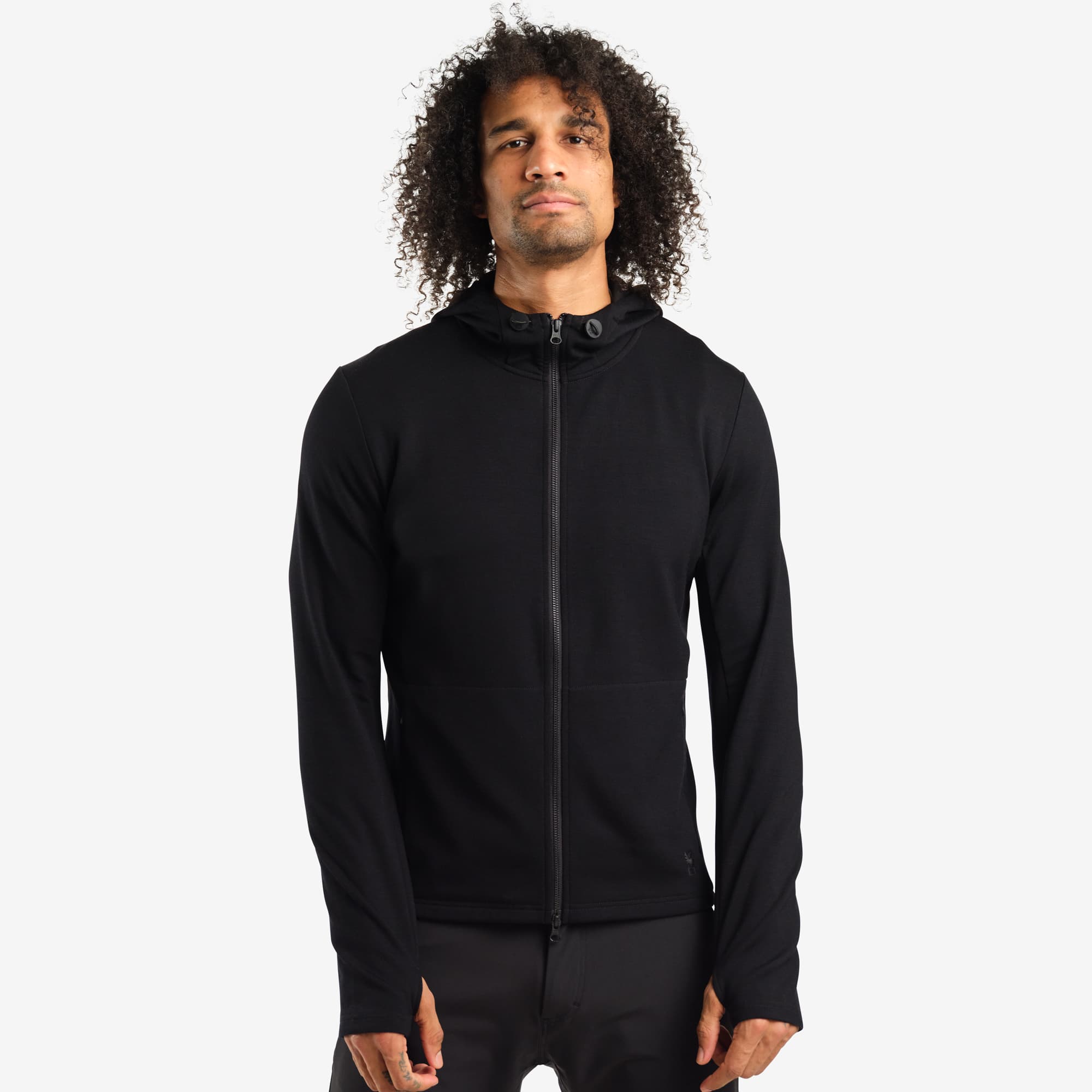 Men's merino blend hoodie in black worn by a man #color_black