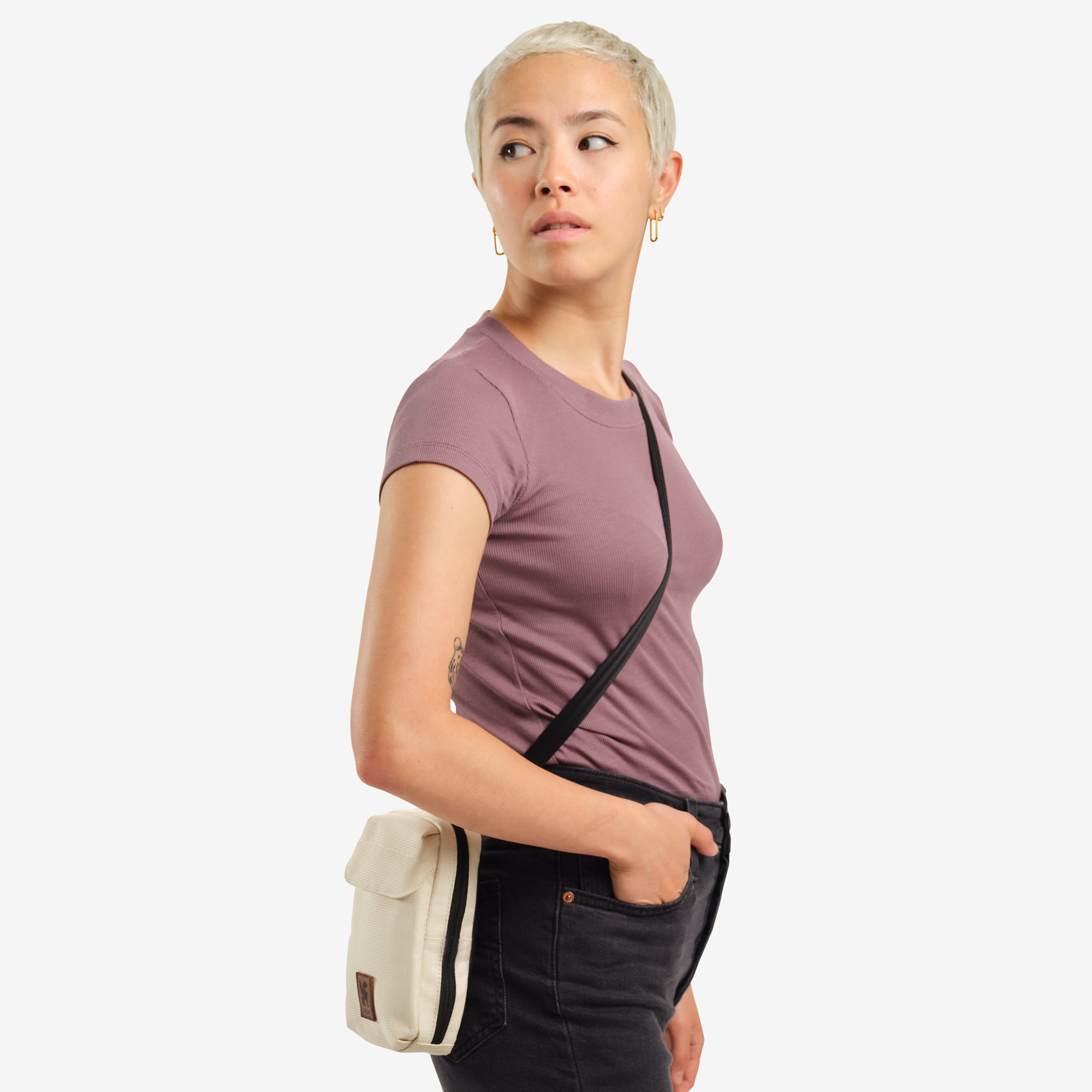 Ruckas Accessory Pouch in natural being worn by a person
