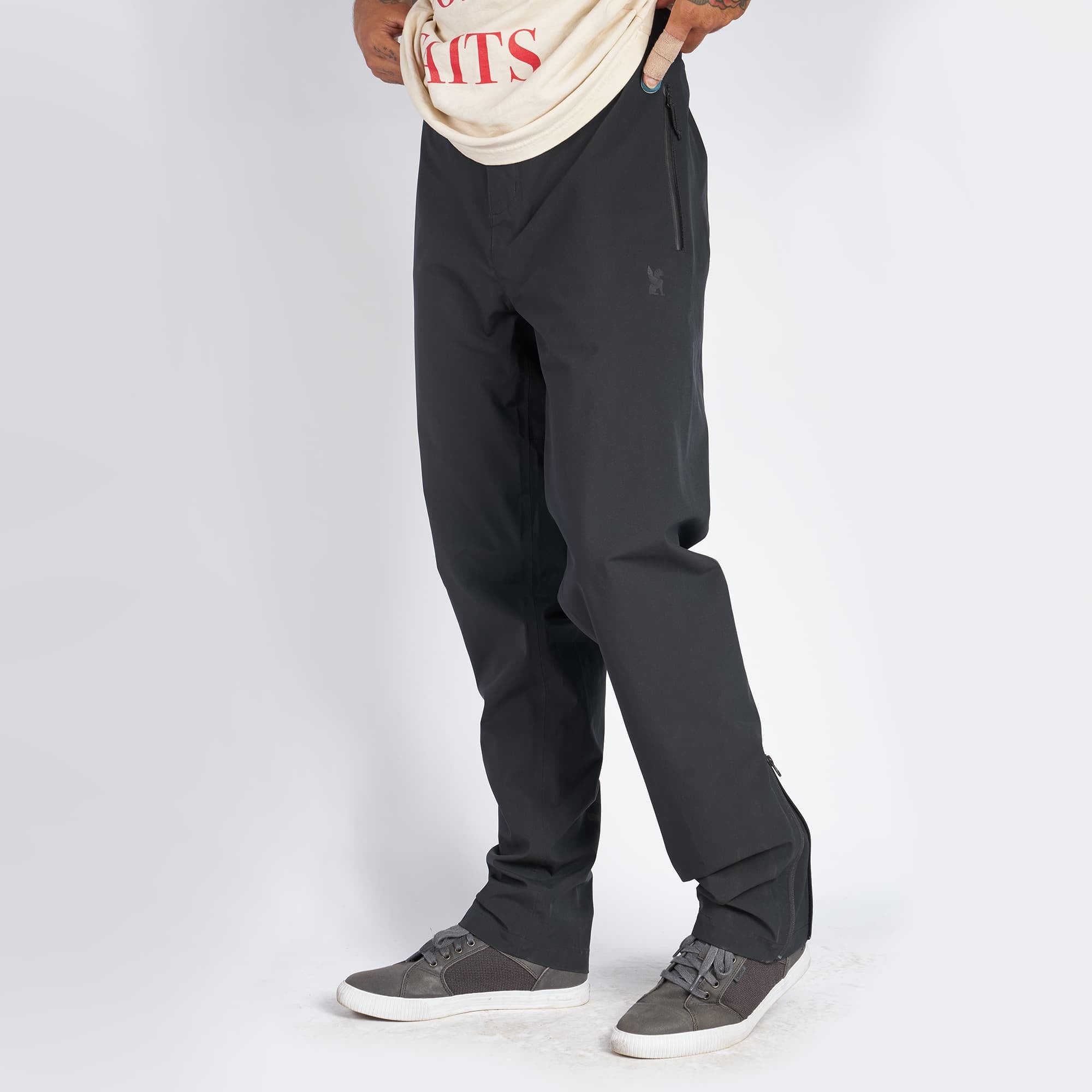 Waterproof rain pant in black shown on a man front view