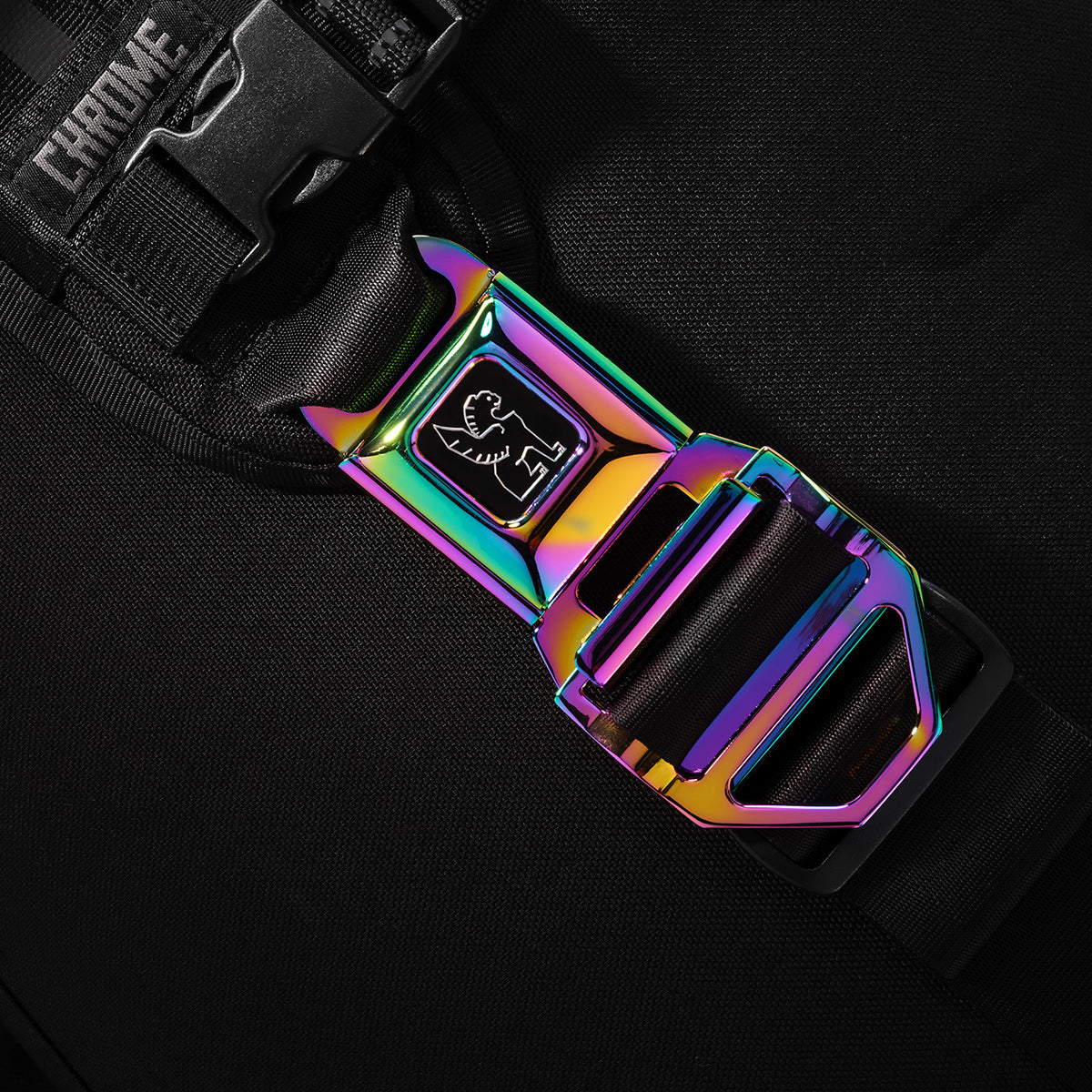 Gay's Okay Collection navigation seatbelt buckle in rainbow reflective